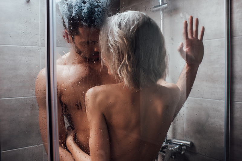 couple taking nude shower